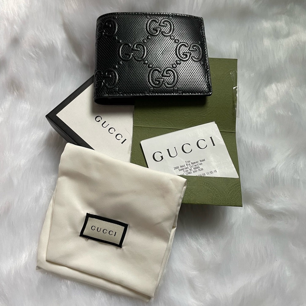 Original brand new GG embossed bi fold wallet